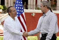 bush_calderon_515.jpg
