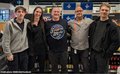 Martin Lachance (au centre) en visite dans une succursale de la SAQ en Outaouais